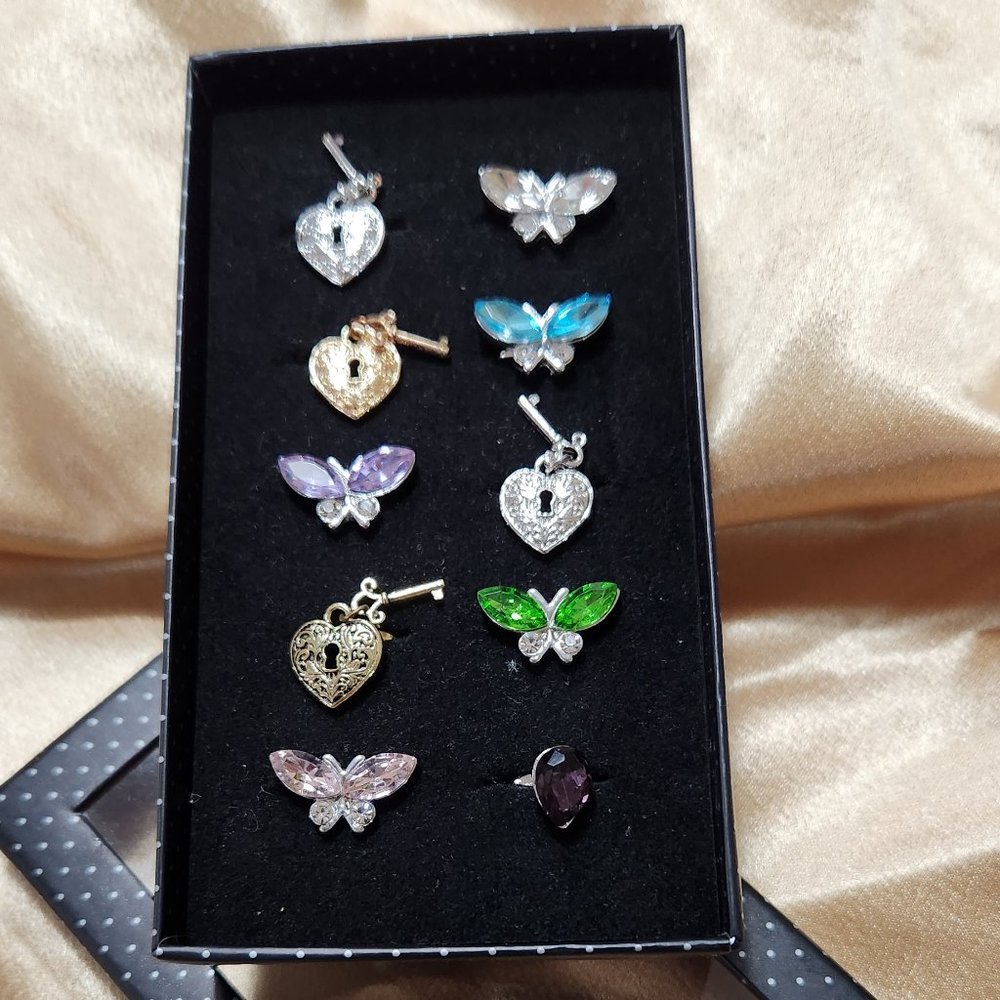 Starlet Shimmer mixed rings in box by Paparazzi